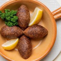 Kebbeh (Kofta) · Kofta. Spheres of beef and cracked wheat, stuffed with minced meat, onion and pine nuts.