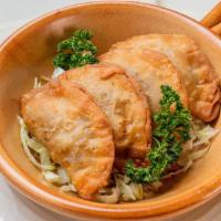 Sambousek · Fried meat pie, stuffed with beef, onion and pine nuts. Each.