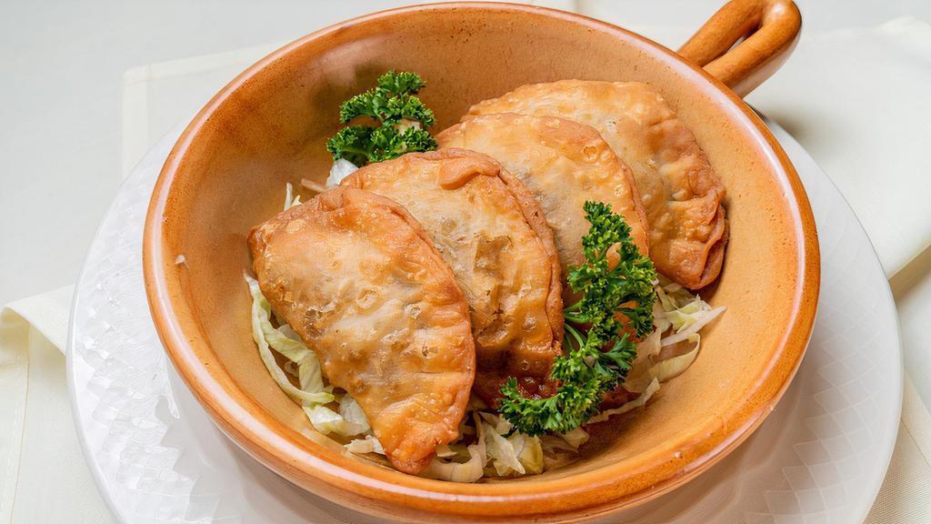 Sambousek · Fried meat pie, stuffed with beef, onion and pine nuts. Each.