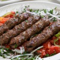 Khash-Khash Kebab By The Pound · Served with broiled tomatoes, peppers, onion-parsley mix, seasoned pita and pickled turnips....