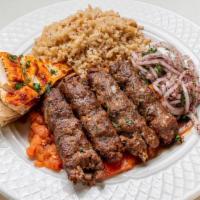 Khash Khash Kebab (Kafta) Plate · Beef lula, garlic, lightly spiced broiled tomatoes.. Served with a choice of 2 sides dishes....