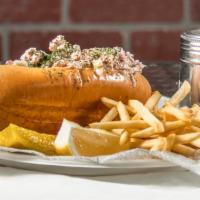 Lobsterino (Our Most Popular) · Lobster tail and knuckle meat blended in our dill house sauce, topped with dill and red onio...