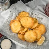 Zucchini Chips · Thick Sliced Zucchini Battered and Deep Fried.