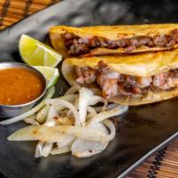 Mambo Combo Tacos · 3 soft tacos with your choice of chicken or beef, carnitas or pastor served with rice and be...