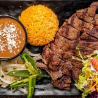 Angus Carne Asada Plate · grilled angus carne asada stake, rice and beans.