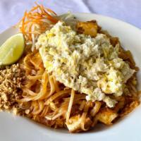 Crab Pad Thai · Fresh crabmeat, fresh rice noodles, tofu, egg, & bean sprouts in tangy tamarind sauce. Serve...