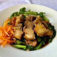 Thai Pork Belly · Crispy pork belly, Chinese broccoli, & carrots wok-fried in Thai garlic sauce