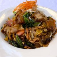 Drunken Noodles · Thick rice noodles, egg, broccoli, bell peppers & Thai basil in savory garlic soy sauce