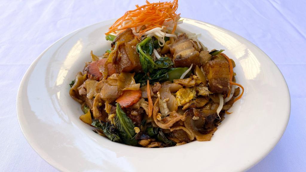 Drunken Noodles · Thick rice noodles, egg, broccoli, bell peppers & Thai basil in savory garlic soy sauce