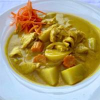 Yellow Curry · Potatoes, carrots, onions, creamy coconut milk & yellow curry