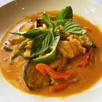 Red Curry · Eggplant, bamboo shoots, bell peppers, fresh basil, creamy coconut milk & red curry