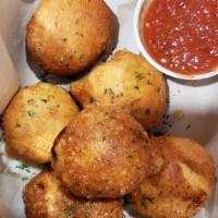 Pizza Bombs · Our bombs are pizza balls stuffed with our 5 cheese blend and topping of your choice, served...