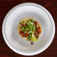 Chicken Taco (Crispy Shell) · Hard shell taco with red chili chicken cheddar, lettuce & jack.