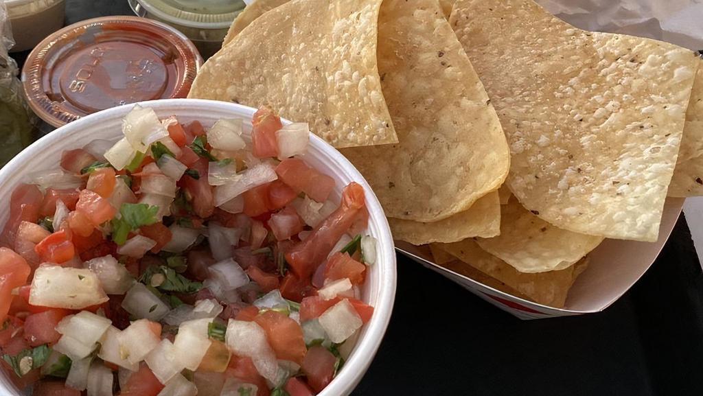 Chips & Salsa · With pico de gallo, cheese, topped with jack cheese.