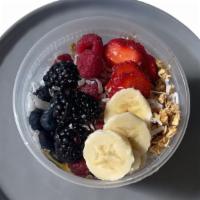 Açaí Bowl · Organic açaí sorbet, granola, strawberries, fresh berries, flaked coconut, sliced almonds, h...