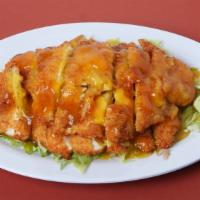 Lemon Chicken Dinner · Serves two. Freshly-chopped crispy chicken served on a light salad bed topped with our speci...