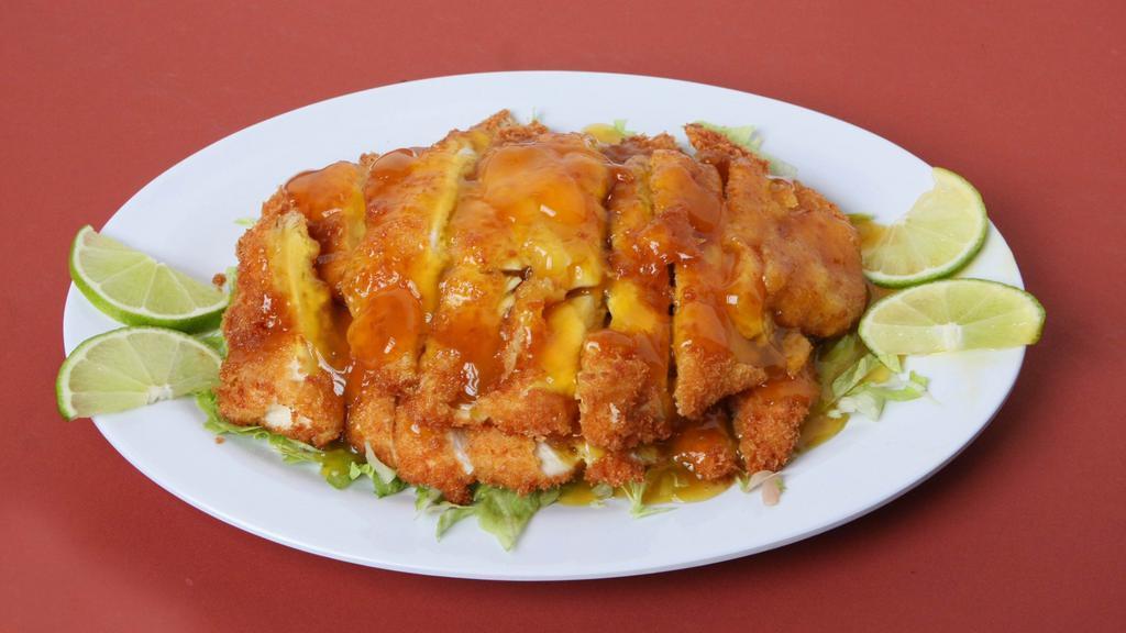 Lemon Chicken Dinner · Serves two. Freshly-chopped crispy chicken served on a light salad bed topped with our special light and tangy lemon sauce. Healthy.