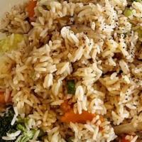 Thai Fried Rice · Egg, onions, peas, carrots, green onion and tomato.
