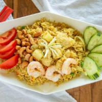Phuket Fried Rice · Egg, chicken and shrimp, onion, tomato, cashew nut, green onion with pineapple and curry pow...
