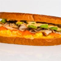 Sourdough, Smoked Turkey, Avocado, Egg, & Cheddar · 2 scrambled eggs, melted Cheddar cheese, sliced smoked turkey, avocado, and Sriracha aioli o...