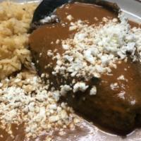 Chile Relleno Plate · Poblano pepper stuffed with panela/oaxaca cheese. Served with beans, rice.