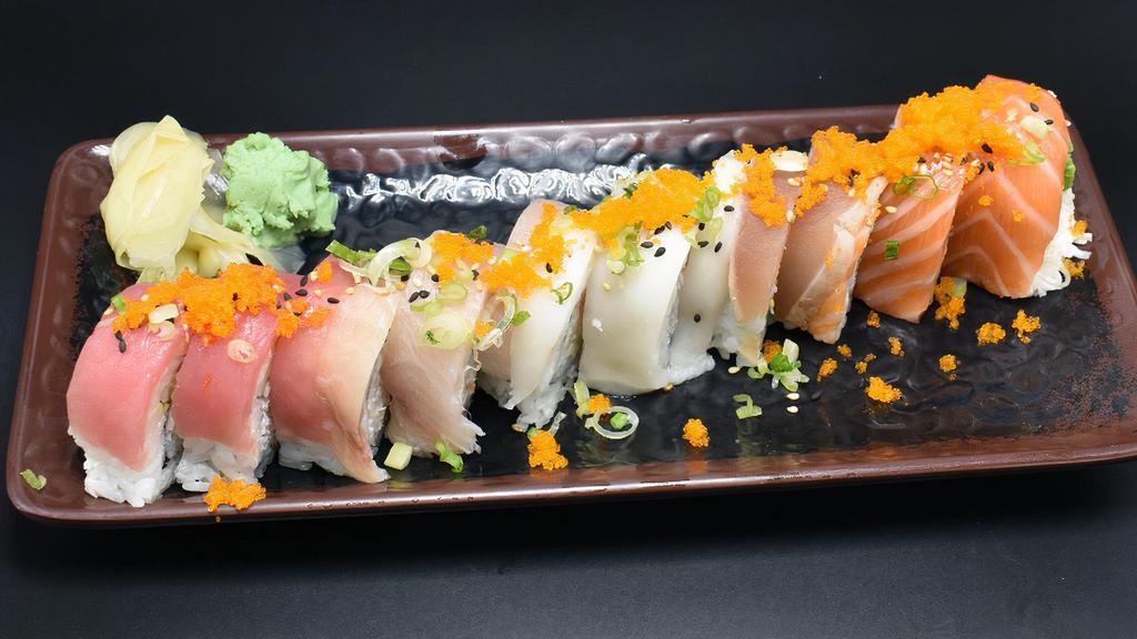 Rainbow Roll · In: crab, avocado, cucumber.
Out: six mix fish, green onion, masago.