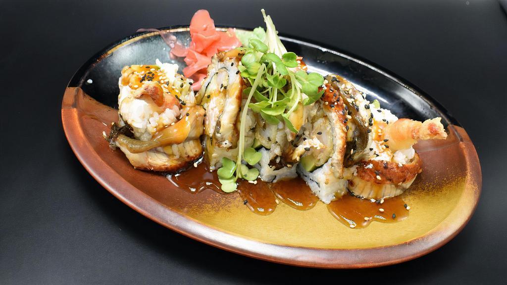 Bulldog Roll · In: Shrimp tempura, crab, avocado, cucumber.
Out: Unagi, unagi sauce.