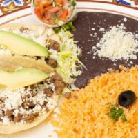 Tacos Nortenos Plate · Gluten free. 2 pieces. Chopped beef, steak or shredded chicken breast topped with cheese and...