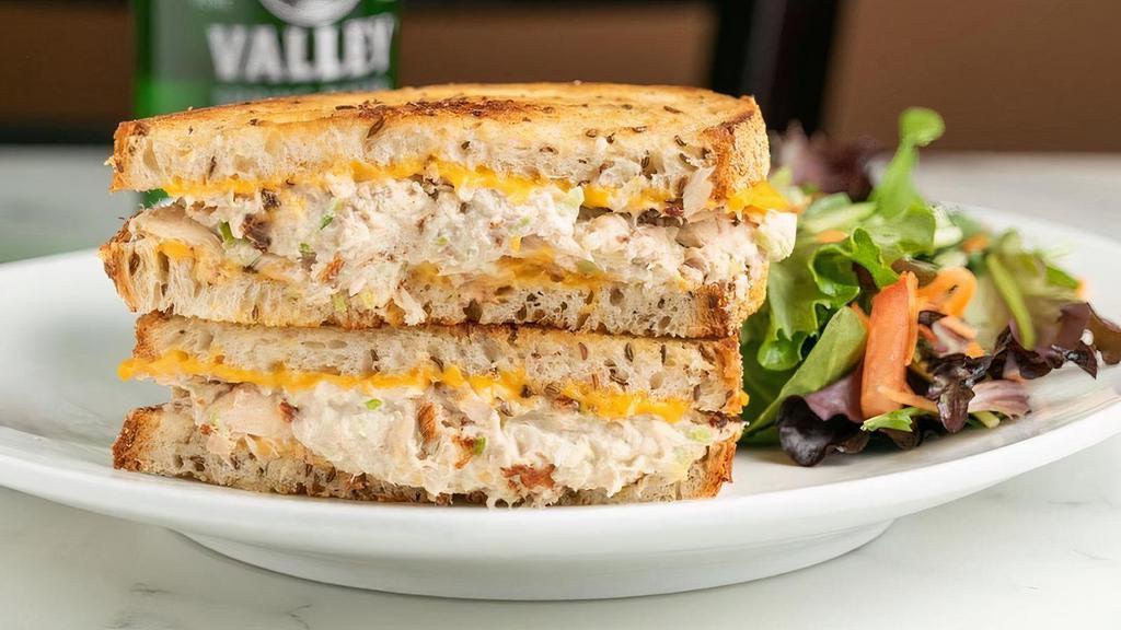 Tuna Melt Sandwich · All-white albacore tuna (line-caught) salad and melted Swiss or American cheese on grilled rye bread