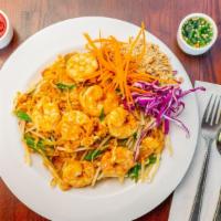 Pad Thai · Vegetarian. Thin rice noodles tossed with egg, scallions, bean sprouts in a Thai tamarind pa...