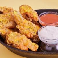 Lemon Pepper Wings · Classic Bone-In Chicken Wings, dressed up in our classic Lemon Pepper rub.