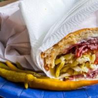 Pastrami Sandwich · Made on a 10-inch French Baguette with pastrami,  provolone cheese, lettuce, tomato, pickles...