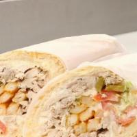 Chicken Sub Sandwich · Made on a 10-inch French Baguette with chicken, garlic spread, tomato, lettuce, pickles and ...
