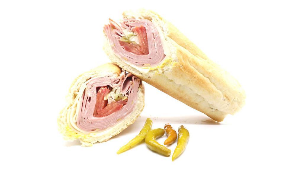 Mortadella Sandwich · Made on a 10-inch French baguette with mortadella, provolone cheese, mayonnaise, lettuce, tomatoes, pickles and mustard.