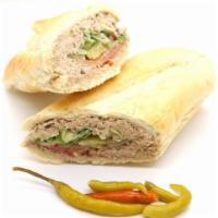Tuna Sandwich · Made on a 10-inch French baguette with tuna, provolone cheese, mayonnaise, lettuce, tomatoes...