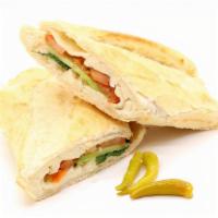 Halloumi Cheese Sandwich · Made on a 10-inch French baguette with halloumi cheese, paprika, mint, olives, cucumber and ...