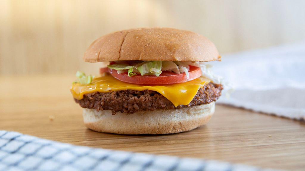 Classic Cheeseburger · Patty choice with American 'cheese,' lettuce, tomato, raw onion, pickles, ketchup, mayo, and mustard.