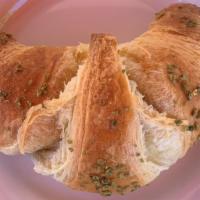 Pistachio Croissant  · Flaky croissant with pistachio cream filling