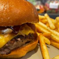 Smokehouse Burger · 1/3 lb Angus beef patty, Cheddar cheese, bacon, caramelized onion, garlic aioli, served with...