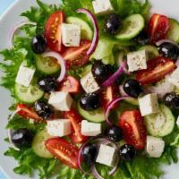 Greek Salad · Tossed arugula, romaine lettuce, roma tomatoes, Persian cucumbers, kalamata olives, shaved r...