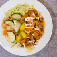 Chicken Shawarma Bowl · Rice, house salad with lettuce, marinated Roma tomatoes, Persian cucumber and parsley, all w...