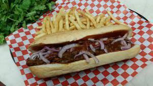 Hot Bbq Beef Sub · Shredded beef and BBQ sauce topped with red onion. Served with fries.