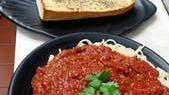 Spaghetti With Meat Sauce · Spaghetti with marinara meat sauce and grated mozzarella. Served with garlic bread.