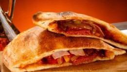 Calzone & Drink · Calzone and drink, served with marinara sauce.