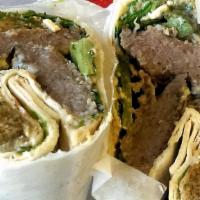 Gyro Gone Wild · All the veggies and sauces of the chicken iliki with gyro meat and falafel (no chicken)