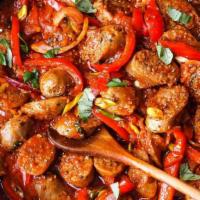 Sausage And Peppers · Italian sausage sauteed with peppers, onions, garlic, and olive oil.