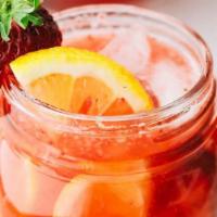 Strawberry Lemonade · Homemade Strawberry Lemonade over Blocks of Ice (32oz)