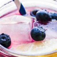 Blueberry Lemonade · Homemade Blueberry Lemonade over Blocks of Ice (32oz)