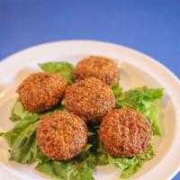 Falafel · Veg. Ground chickpeas seasoned with onions, garlic, parsley and special spices. Formed into
...