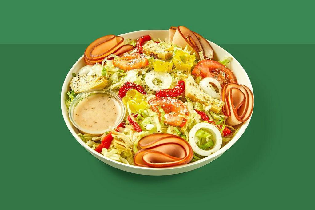 The Turkey Salad · Sliced smoked turkey, shredded iceberg lettuce, Parmesan cheese, roasted red peppers, sliced tomato, artichoke hearts, onions, mild banana peppers & 